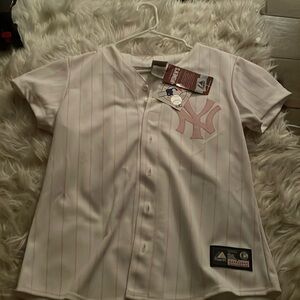 Light pink and white baseball jerseys brand new never been worn very pretty